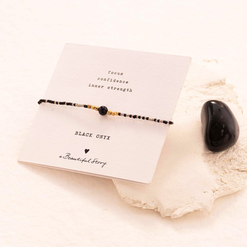 Iris Card Schwarzer Onyx goldfarbiges Armband