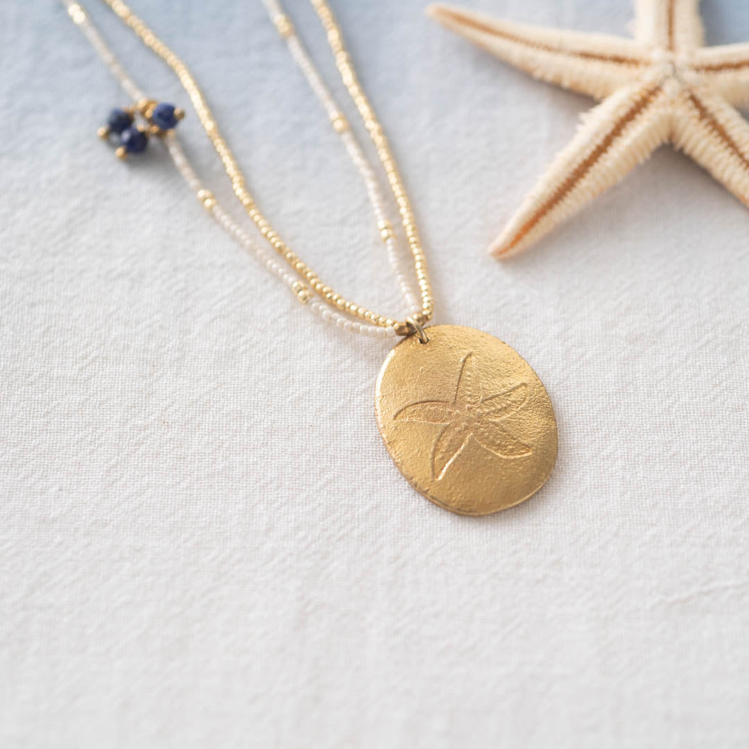 Courage Lapislazuli goldfarbige Halskette