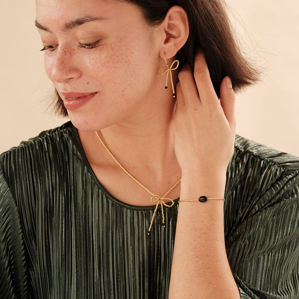 Bow Zwarte Onyx Goudkleurige Oorbellen