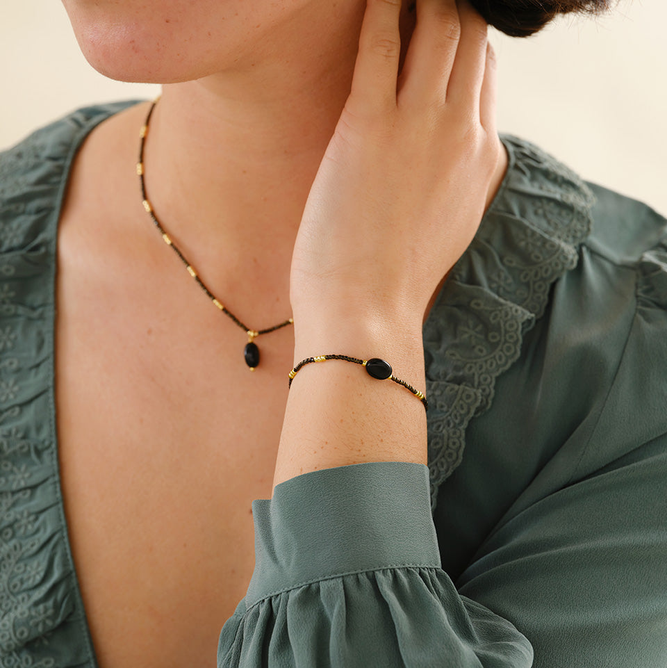 Wanting Schwarzer Onyx Armband Goldfarben